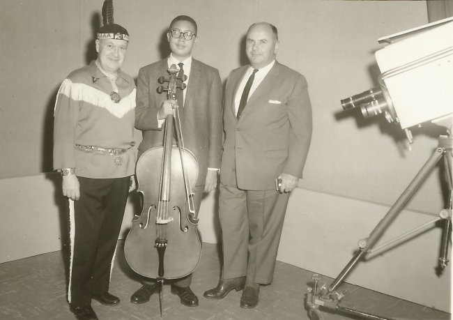From Left: Joe Kelly emcee of station WTTW's "Totem Club" Show, Earl Madison and R. Gregory Durham president of Lyon-Healy Chicago